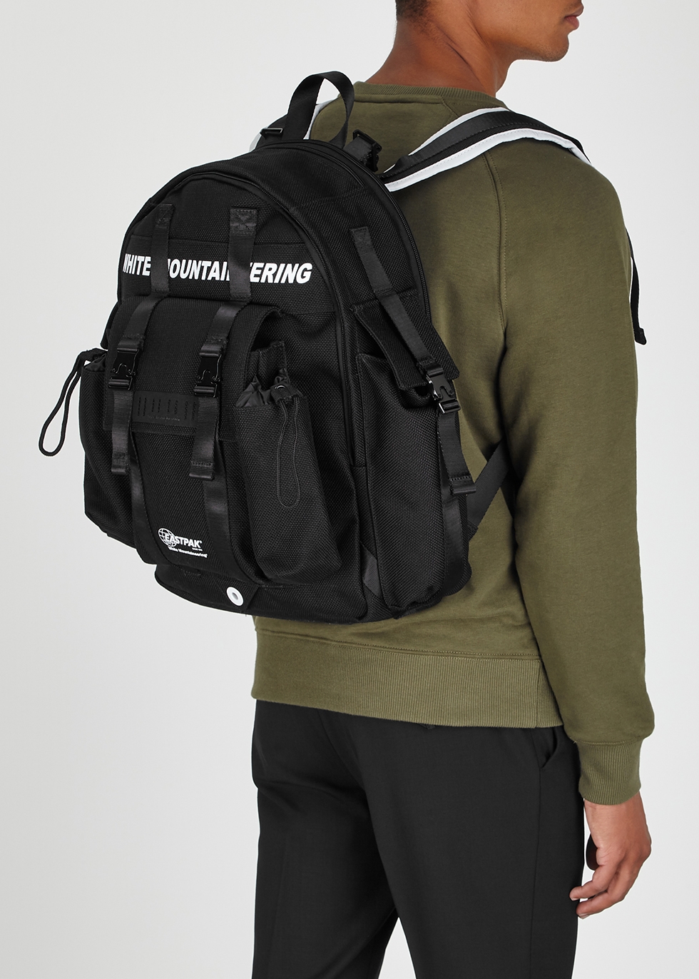 white mountaineering backpack