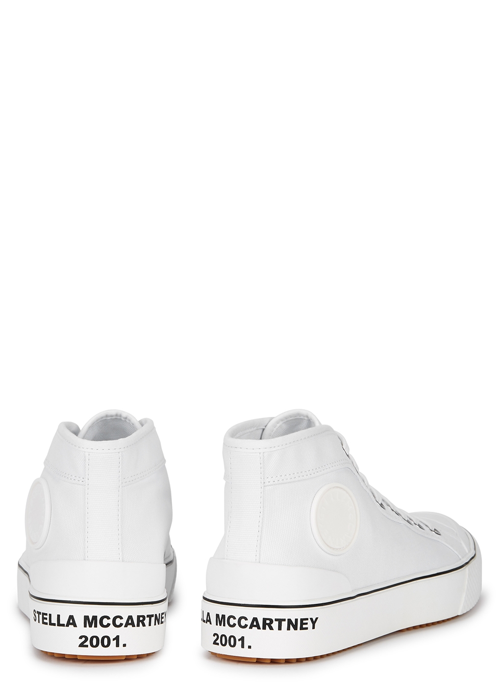 white canvas sports shoes