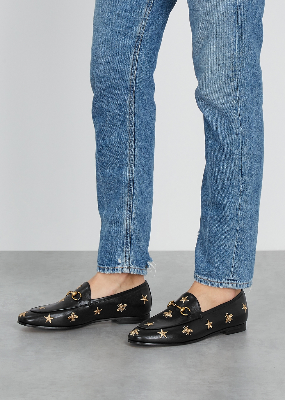 black and gold gucci loafers
