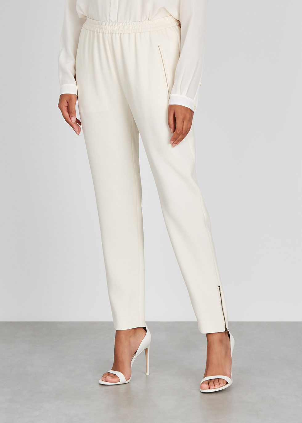 white tapered trousers