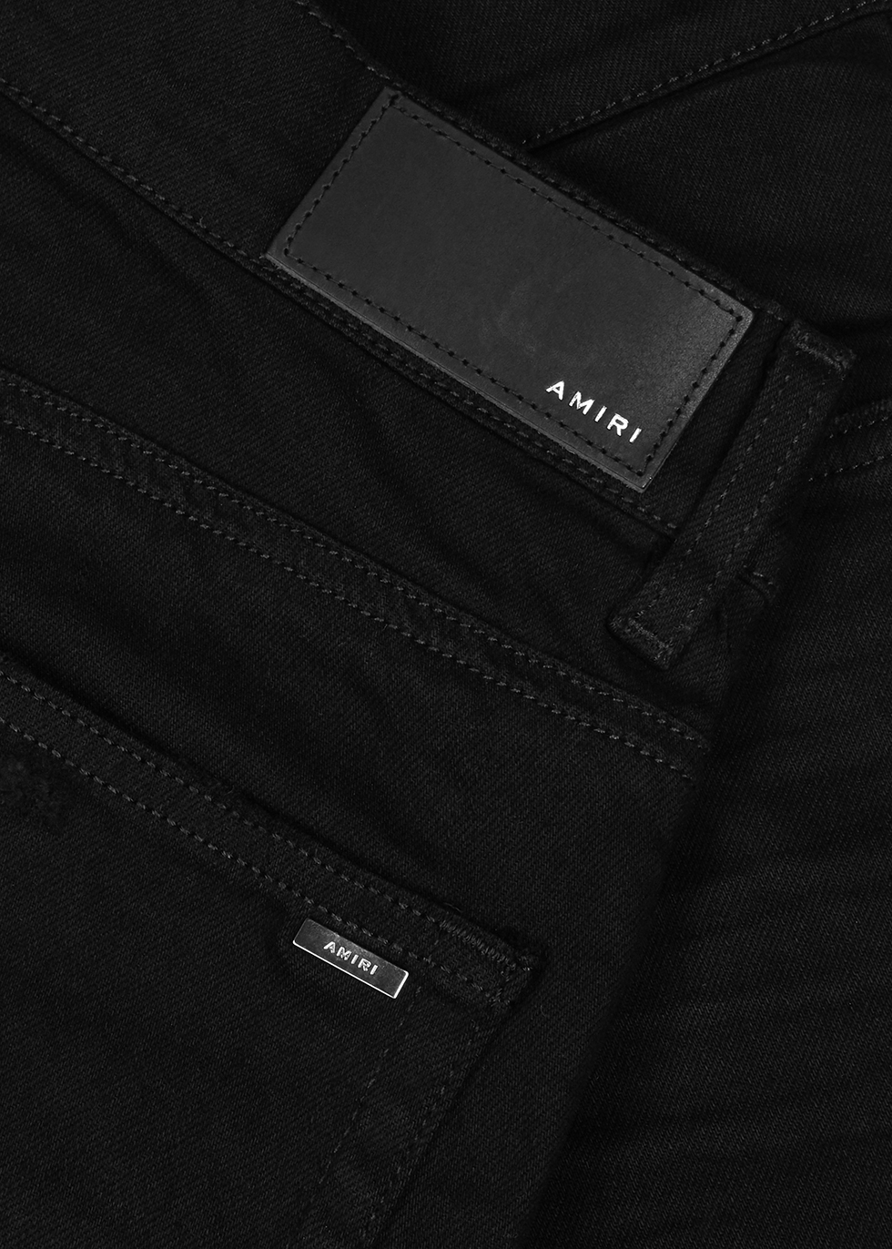 black and white amiri jeans