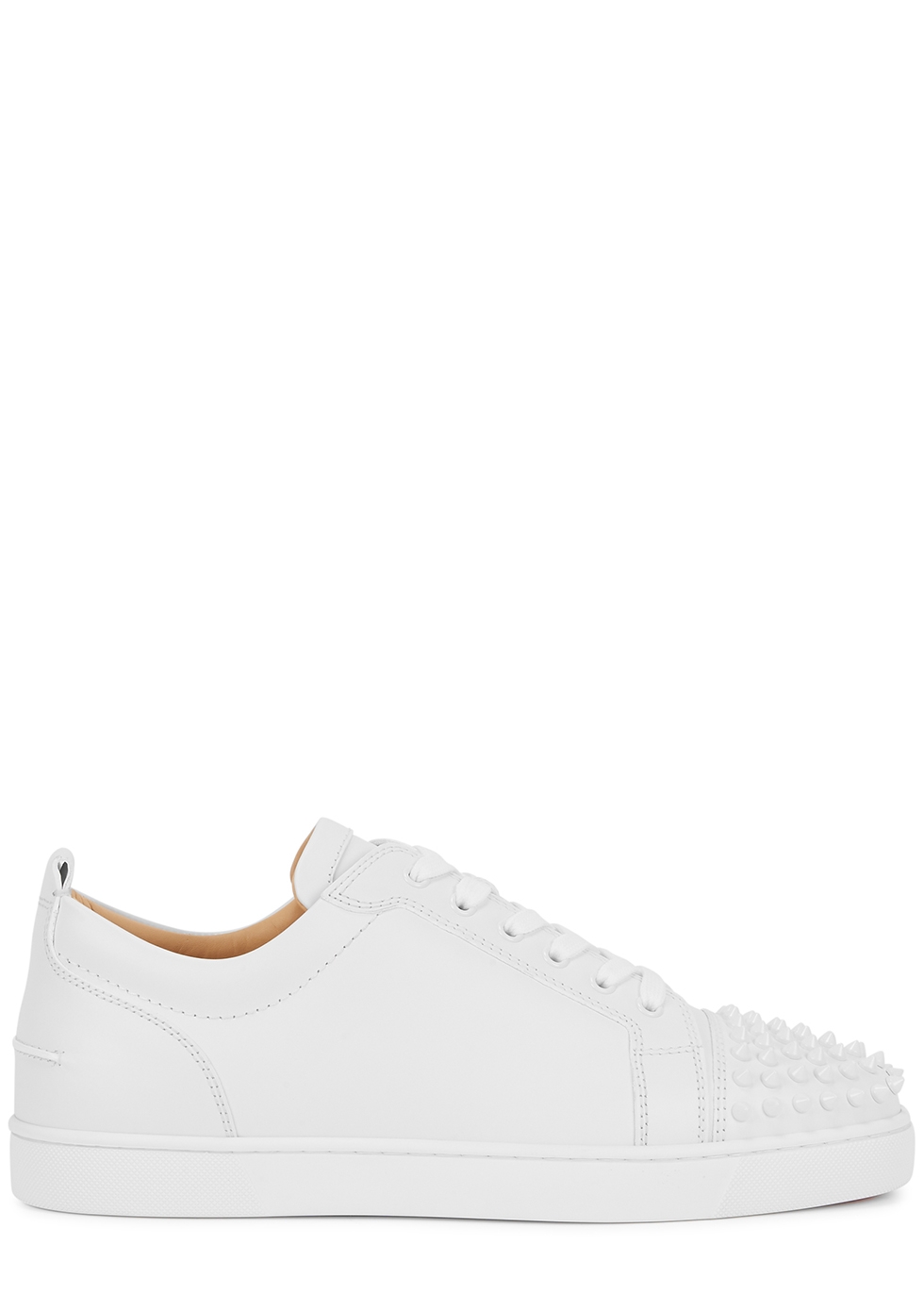white sneakers with spikes