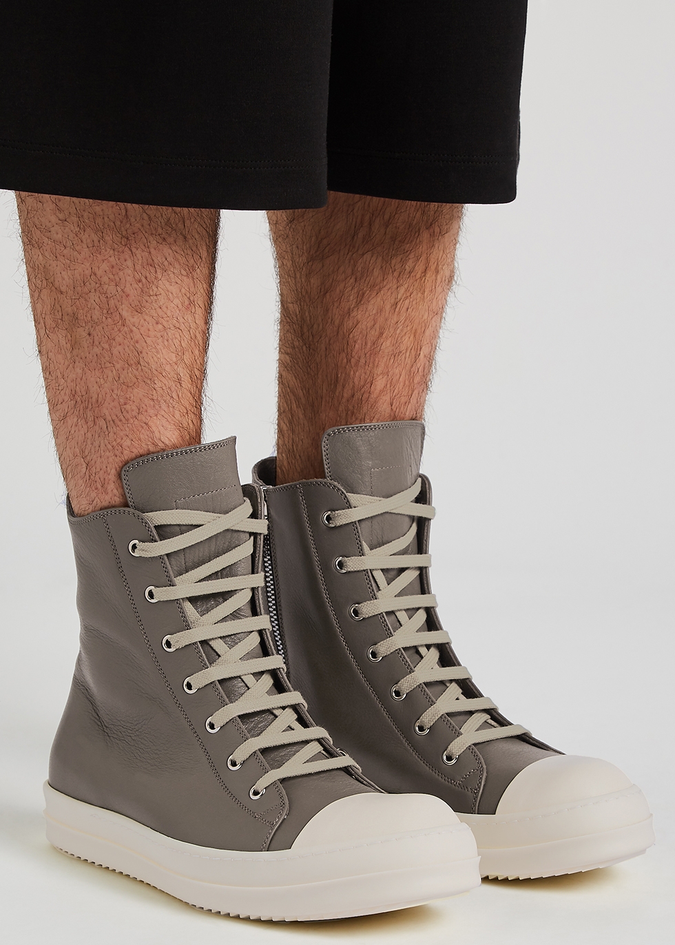 grey high top slip on sneakers