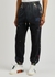 Black logo paint-splatter cotton sweatpants - BOSSI Sportswear