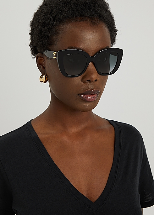 Gucci Black oversized cat-eye sunglasses - Harvey Nichols