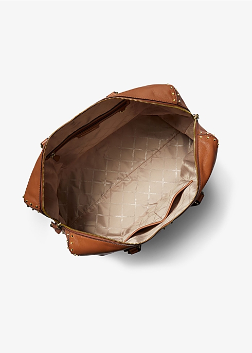 MICHAEL Michael Kors Astor extra-large studded leather weekender bag -  Harvey Nichols